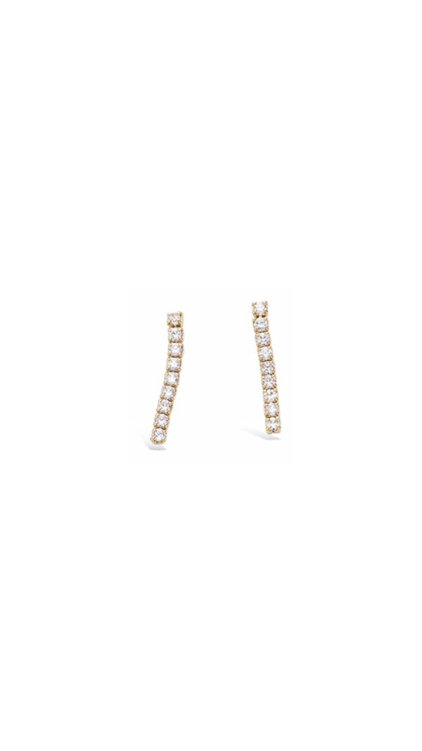 Boucles d'oreilles pendantes plaquées or aux pierres blanches.