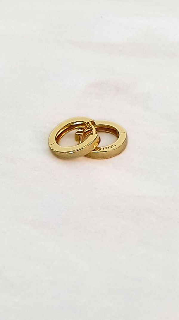 Créoles de la marque Zinzi en argent rhodié 925 millièmes de couleur jaune or en présentation